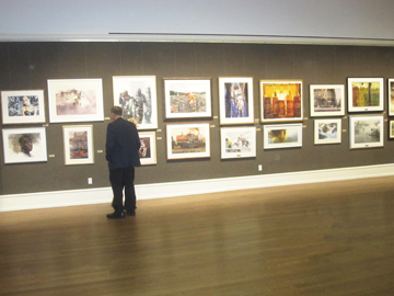 A visitor at the American Watercolor Society's 147th annual exhibition